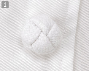 半袖コックコート(33-KG428)の商品詳細「組紐ボタン」