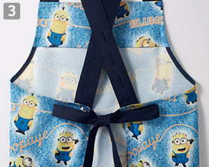 ミニオン　エプロン(71-MU502)の商品詳細「ボタンホール」